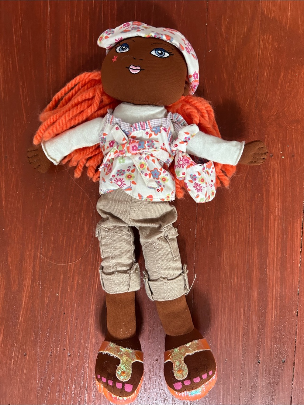 The Children's Place Brown Girl Rag Doll with Orange Yarn Hair and Floral Outfit